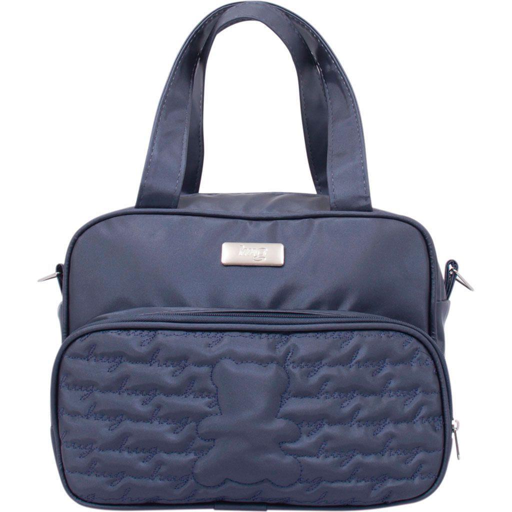 teddy in a bolsa