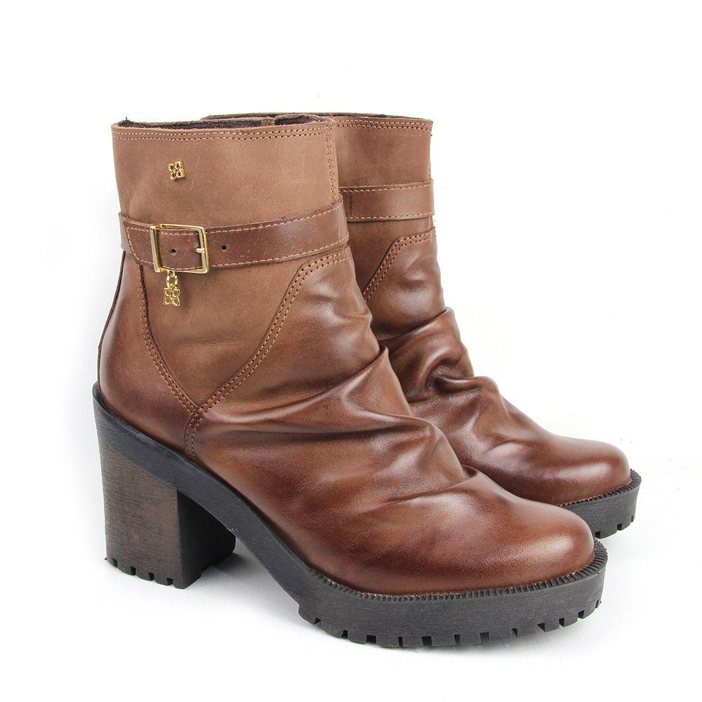 bota com solado tratorado