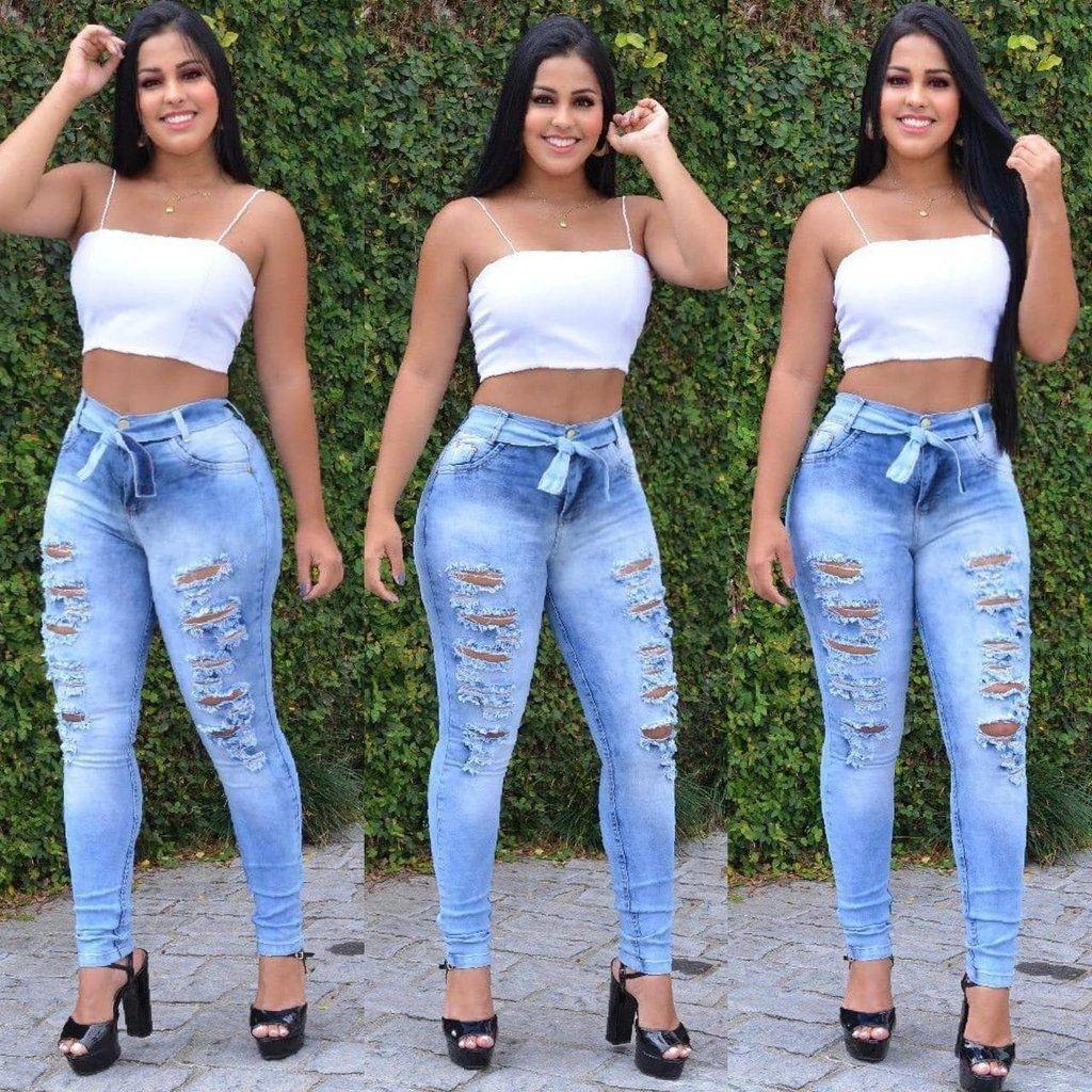 jardineira jeans feminina rasgadinha