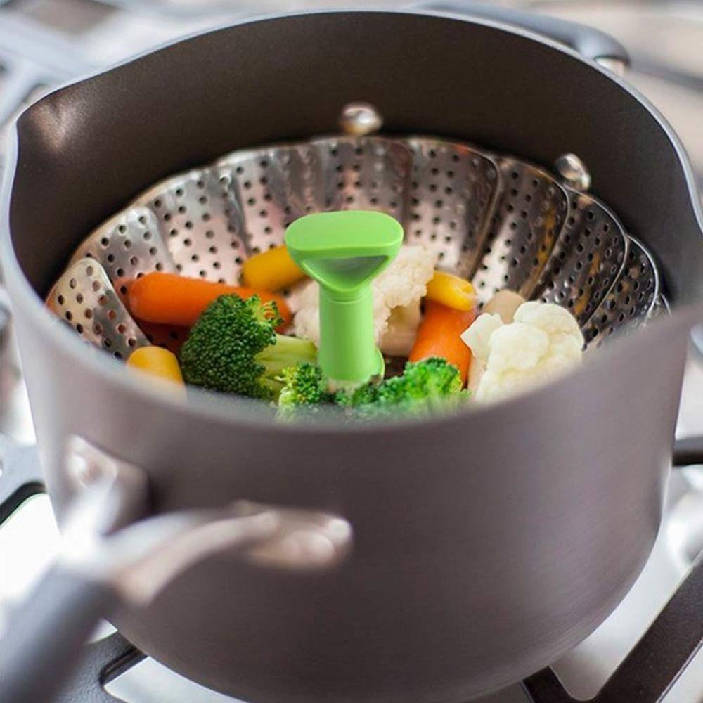 Peneira para temperar legumes cozidos no vapor