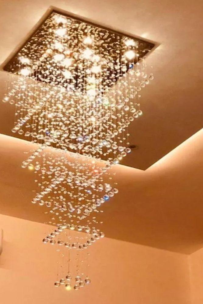 Lustre para pé direito duplo base de inox polido espelhado de 70x70cm