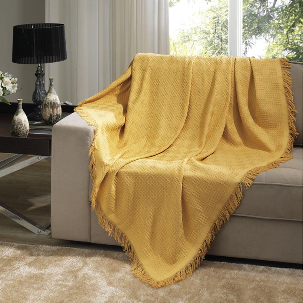 Decoração inverno: como usar mantas para o sofá