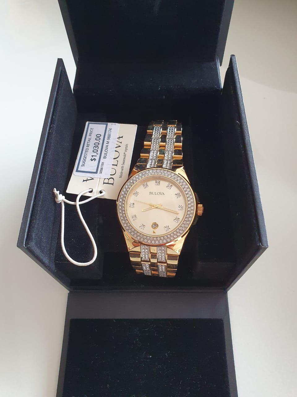 relogio bulova preto e dourado