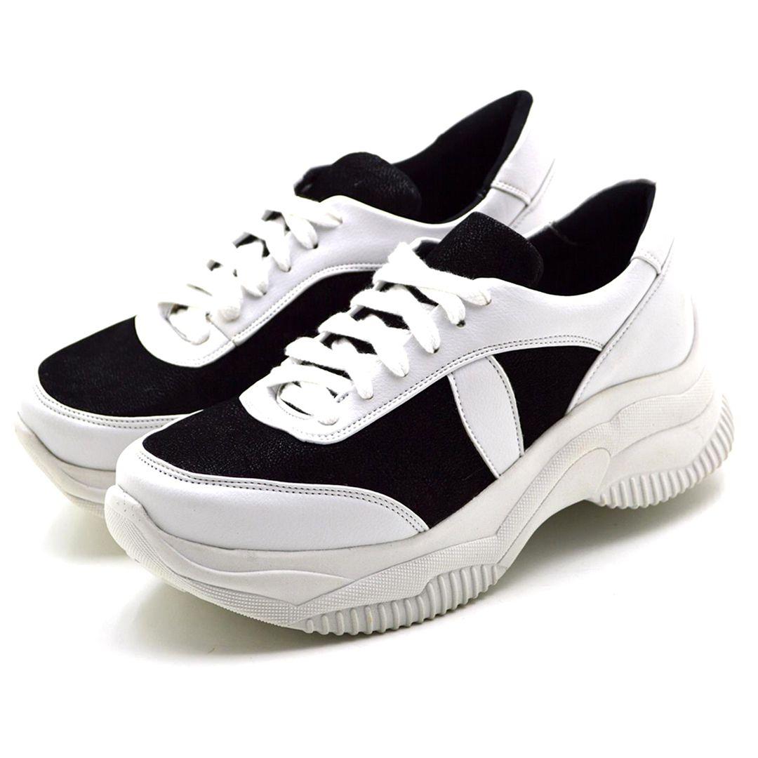 tenis preto com ponta branca