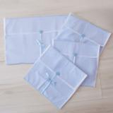 Kit Saquinhos Maternidade 4 Peças para Roupas Duplo Tule Poá Azul e Branco com Pérolas - Mais que baby