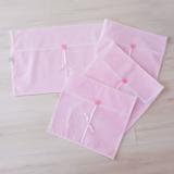 Kit Saquinhos Maternidade 4 Peças para Roupas Duplo Tule Poá Rosa e Branco com Pérolas - Mais que baby