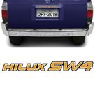 Adesivo Traseiro Hilux Sw4 2002 Emblema Dourado Resinado
