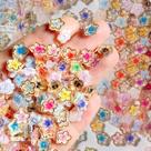 Adornos para Nail Art Quezadyl 100 Peças Flores de Resina com Borda Dourada