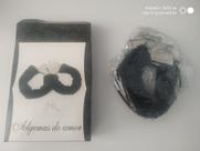 Algema de metal com pelucia
