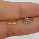ARGOLA AÇO OVAL CLICKER COM ZIRCÔNIAS CRISTAIS - 1,2mm - DOURADO