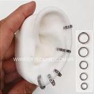Argola clicker de titânio pirâmide dourada com fecho
