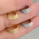 ARGOLA CLICKER DE TITÂNIO TRINNY COM ZIRCÔNIAS - 1,2mm