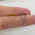 Argola titânio com correntinha e pingente oval dourado