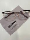 Armação de acetato com transparência,haste com detalhe em metal dourado. Fiu-Fiu