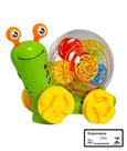 Bebe Musical Caracol Braskit Brinquedo Bate e Gira com Musica Luzes Projetor e Engrenagens