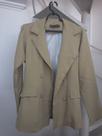 Blazer de alfaiataria com um botão forrado