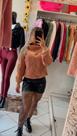 Blusa de lã, na cor nude