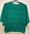 Blusa decote canoa, manga larga, em linha vazada