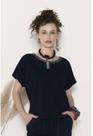 Blusa malha jeans com ilhós