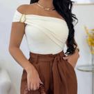 Body feminino fivela orgânica tendência verão 2025 moda gringa casual elegante
