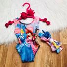 Bodys Menina Infantil Temático Baby Baby Princesas + Laço de Cabelo