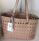 Bolsa com alça na cor bege de coro