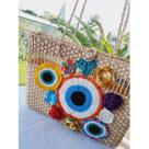 Bolsa de Palha Customizada com Olho Grego e Flores de Crochê. Bolsa de Palha Customizada com Olho Grego e Flores de Crochê.