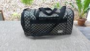 Bolsa de viagem com bolsos na lateral