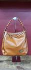 Bolsa femenina marrom brilhosa