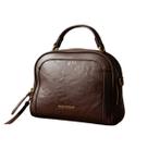 Bolsa feminina baú marrom escuro Pavão de Ouro