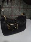 Bolsa feminina bem versatil