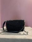 Bolsa preta cravejada
