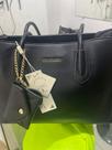 Bolsas pavão de ouro preta