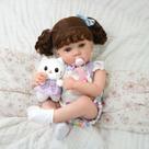 Boneca Bebê Reborn Silicone 48cm Menina Olho Azul com Acessórios Pode dar Banho Brastoy