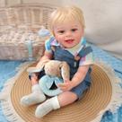 Boneco Bebê Reborn Brastoy Realista Silicone 55cm Conjunto de Roupa Chupeta Mamadeira e Pelúcia Pode Dar Banho Roupa