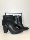 bota tachas