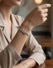 Bracelete de Aço Inox com Banho Dourado Aro Prego