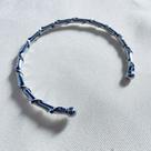 Bracelete Prateado Torcido em Aço Inox