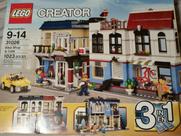 Brinquedo de construção LEGO Creator Bike Shop & Cafe 31026 com 3 minifiguras