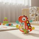Brinquedo Dino Sensorial Chocalho Interativo Bebês Montessori Mordedor Chocalho Puxa Anti stress