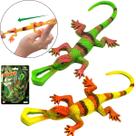 Brinquedo Reptil Voador Emborrachado Estica e Solta Lançamento