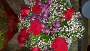 Buque de rosas vermelhas com 12
