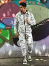 Calça corta vento camuflada