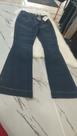 Calça Jeans Escura Flare Bolso Faca