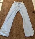 Calça jeans feminina bem versátil Calça jeans feminina bem versátil