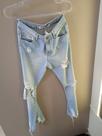Calca jeans rasgo
