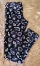 calça legging preta estampada marca tile e sul numero 14