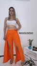 Calça pantalona dunas com fendas e detalhe de corrente. lançamento da coleção outono inverno 2023.