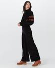 Calça Wide Leg Feminina Em Plush Canelado Calça Wide Leg Feminina Em Plush Canelado