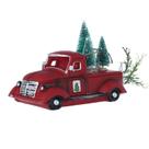 Caminhão vermelho vintage com decoração de Natal com árvore de Natal iluminada